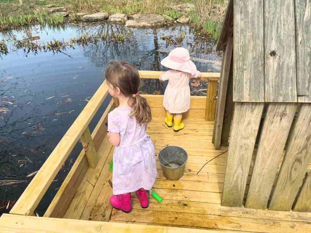 kids exploring the boat at the Kentucky Children's Garden
