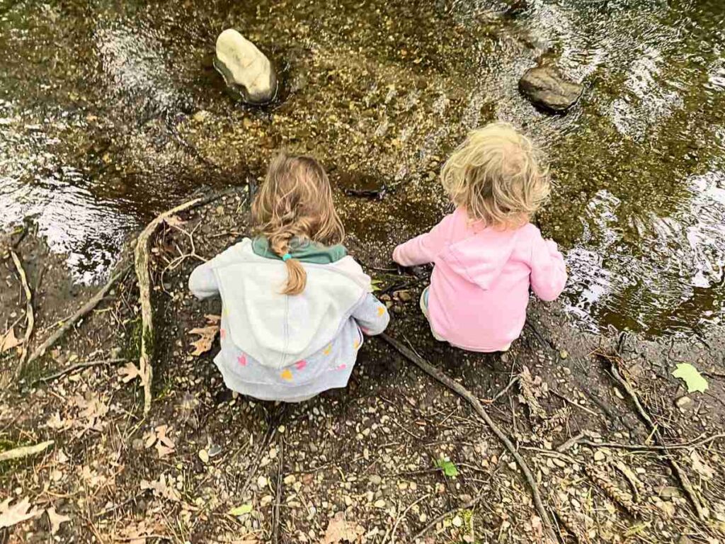 Children exploring a stream in Cades Cove campground